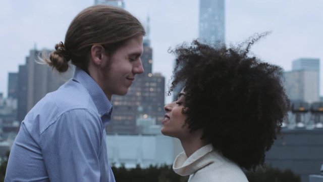Romantic couple on rooftop in New York