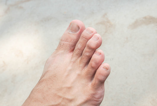 close up men show clean foot toes