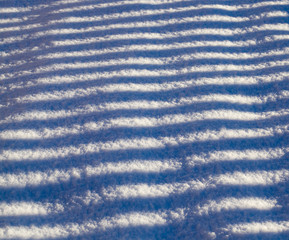 striped shadows on a Sunny day