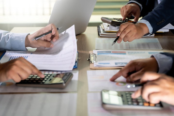 calculator finance accounting achievement to balance man assistant accounting analyzing financial document data charts and graphs