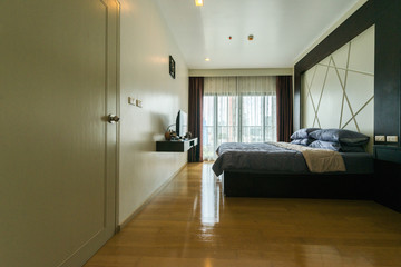 Modern interior design in small apartment with bedroom