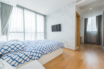 Modern interior design in small apartment with bedroom