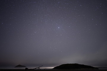 Fototapeta premium ..The stars, the islands, and the sea at night near Tofino BC..