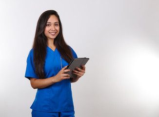 Female Nurse Takes Digital Notes