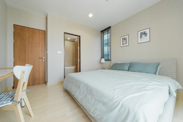 Fototapeta na wymiar Modern interior design in small apartment with bedroom