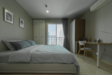 Modern interior design in small apartment with bedroom