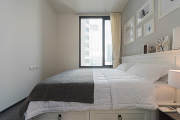 Fototapeta na wymiar Modern interior design in small apartment with bedroom