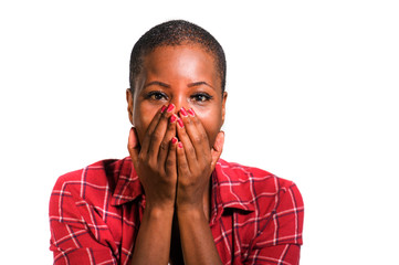 young beautiful and cool black African American woman in casual shirt and shaved hair excited and...