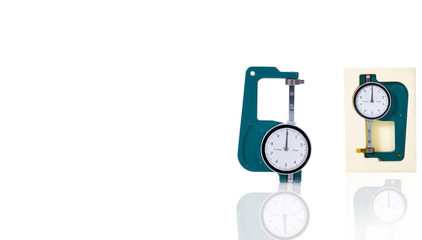 Green thickness gauge isolated on white background. Snap vernier calipers. Measurering tools....