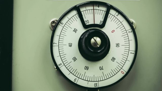 Old scale dial meter rotation from zero to ten round