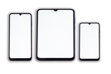 Tablet and two smartphones of different sizes on a white isolated background.