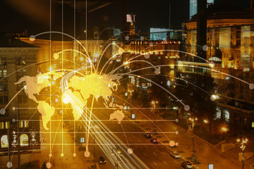 View of modern city with location pointers at night