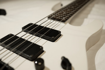 minimalism flat lay bass guitar isolated on white background