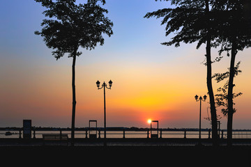 The sun rises on the Hau river