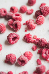 Macro shot of frozen raspberries