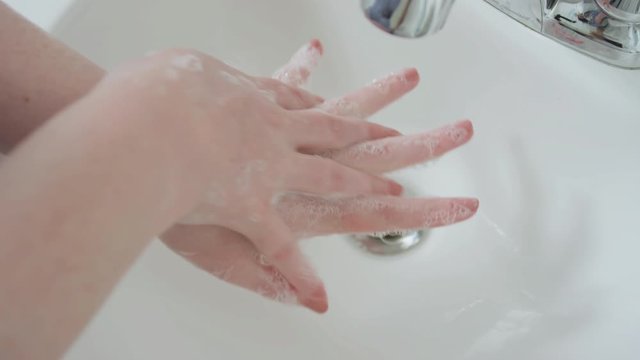 Closeup, Woman Uses Proper Hand Washing Technique, Conserves Water, Faucet Off