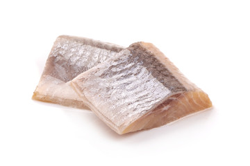 Marinated atlantic herring, sliced fish fillet, isolated on white background