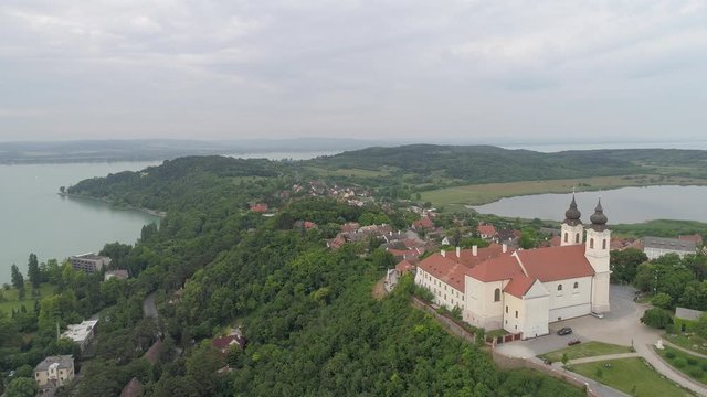abbey, aerial, ancient, architecture, balaton, beautiful, benedictine, bird eye view, blue, building, cathedral, christian, christianity, church, cloudy, country, cross, drone, faith, fly, garden, his