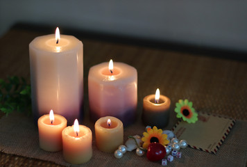 Fototapeta na wymiar set candles flame on black background