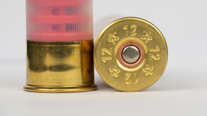 12 gauge shotgun ammunition on a white background