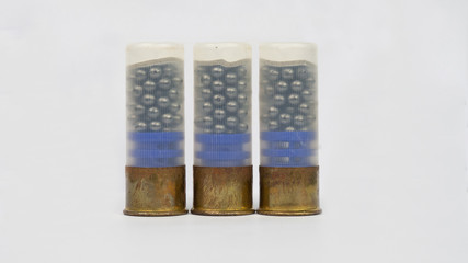 12 gauge shotgun ammunition on a white background