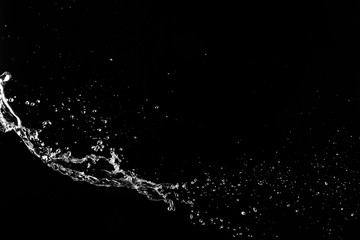 Splash of clean water on dark background