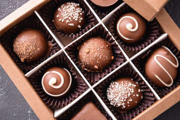 Box with delicious candies, closeup