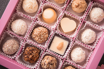 Box with delicious candies, closeup