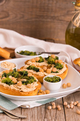 Friselle with turnip tops and hummus.