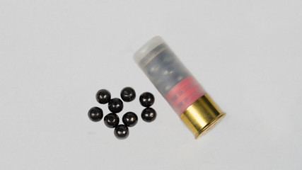 12 gauge shotgun ammunition on a white background