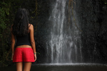 Waterfall and woman Tahiti