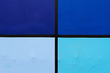 Fototapeta premium Colorful (black, light and dark blue) painted wall as background, texture