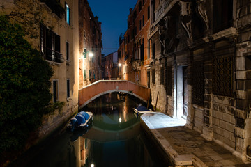 Obraz na płótnie Canvas Romantic narrow canal in Venice in the evening, Italy. Walking, traveling, tourism