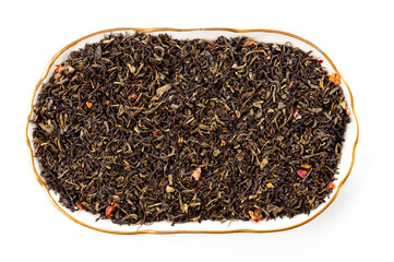 A mixture of black and green tea with vanilla-strawberry flavor, sliced strawberries and rose petals. Background for tea and antioxidants.