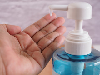 The alcohol gel in the bottle, hand cleanser pump kills some germs, bacteria, and viruses. Health concept..