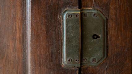 Wooden doors and brass locks