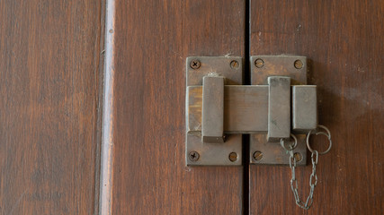 Wooden doors and brass locks