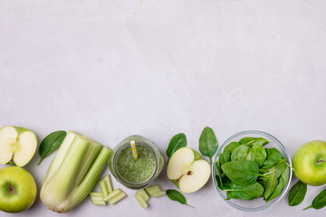 Glass Jar of Healthy Green Smoothie Detox Drink wirh Green Apple Celery and Raw Spinach Diet Beverage Copy Space