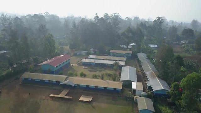 Aerial view moving shot, scenic view of the school roof and landscape in Goroka, Papua New Guinea.