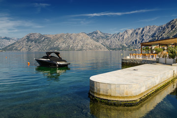Sunny morning view of Kotor bay near village Dobrota, Montenegro.