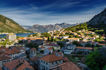 Fototapeta na wymiar Sunny morning panoramic view of Kotor bay from ruins of Kotor's castle of San Giovanni, Montenegro.