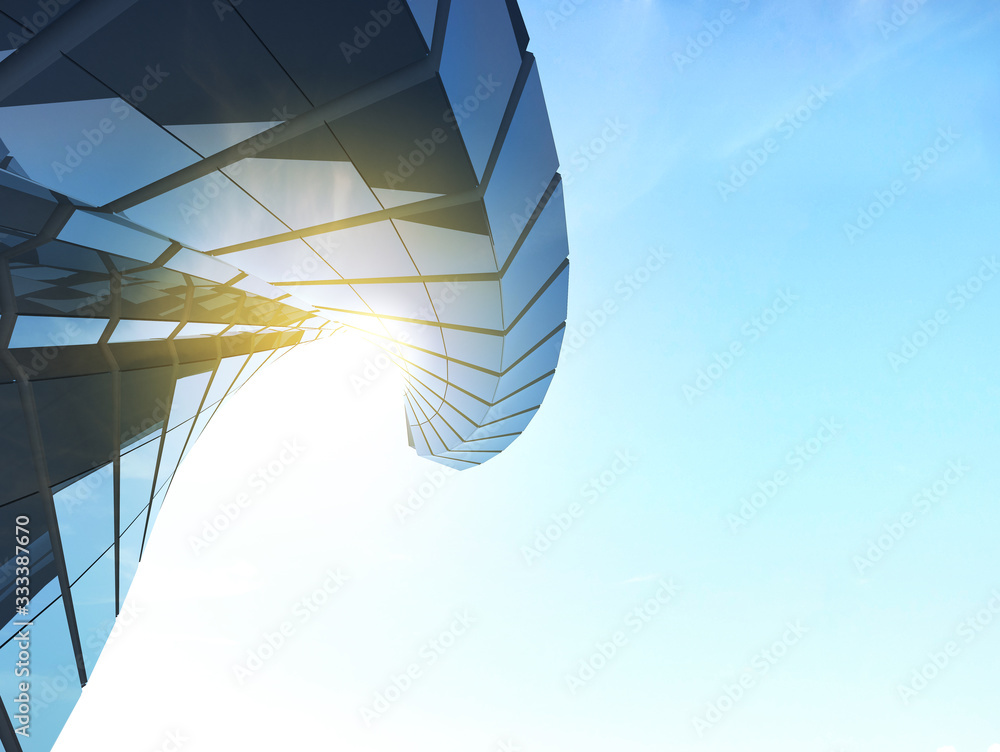 Leinwandbilder view of twisted glass building on blue sky background,business concept of future architecture,lookin