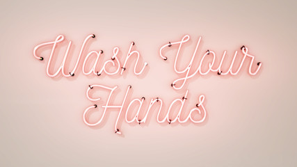 Wash Your Hands bright neon sign on a white background, reminding people to wash their hands after...
