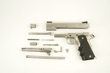 Parts  of a .45 ACP hand gun, Model 1911. 11 mm gun.