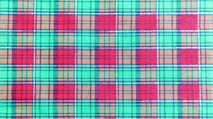 Green and red tartan or plaid background for fashion design. Tartan or plaid pattern. Tartan or plaid background, Tartan or plaid fabric texture.