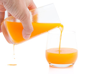 Freshly squeezed orange juice on a white background