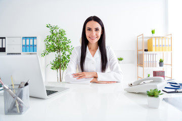 Photo of beautiful doc lady modern technology notebook on table listen interested patient friendly smile wear stethoscope white lab coat sit chair office clinic indoors