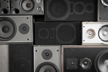Music sound speakers hanging on the wall in retro vintage style, stacked sound boxes modern