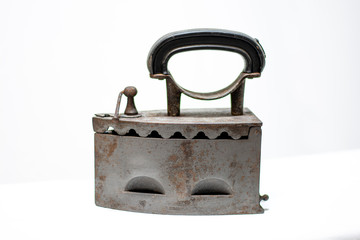 Antique coal iron isolated on white background
