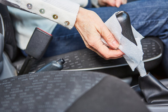 Motorists Disinfect Gear Lever In Car